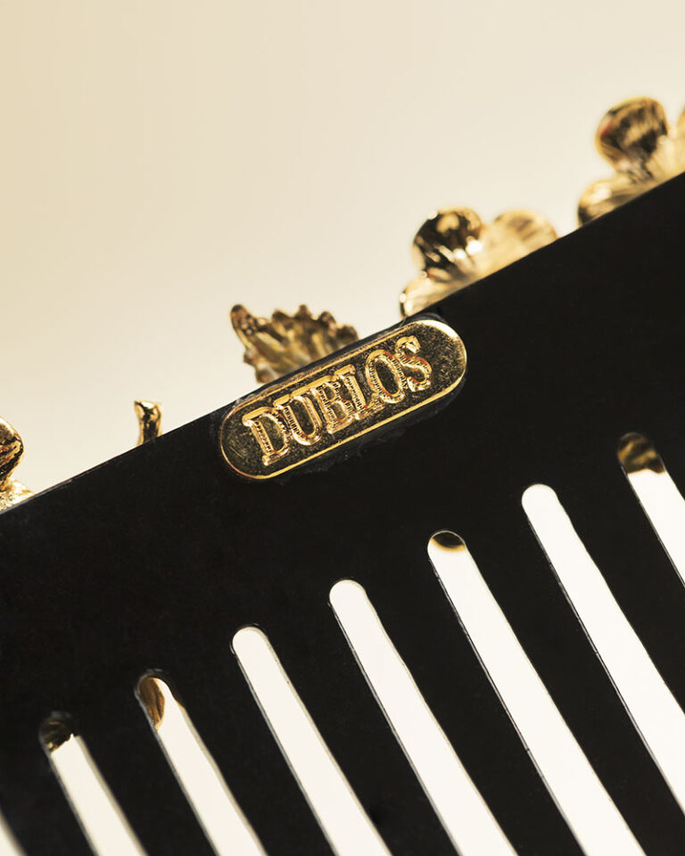 Dublos black ornamental comb detail